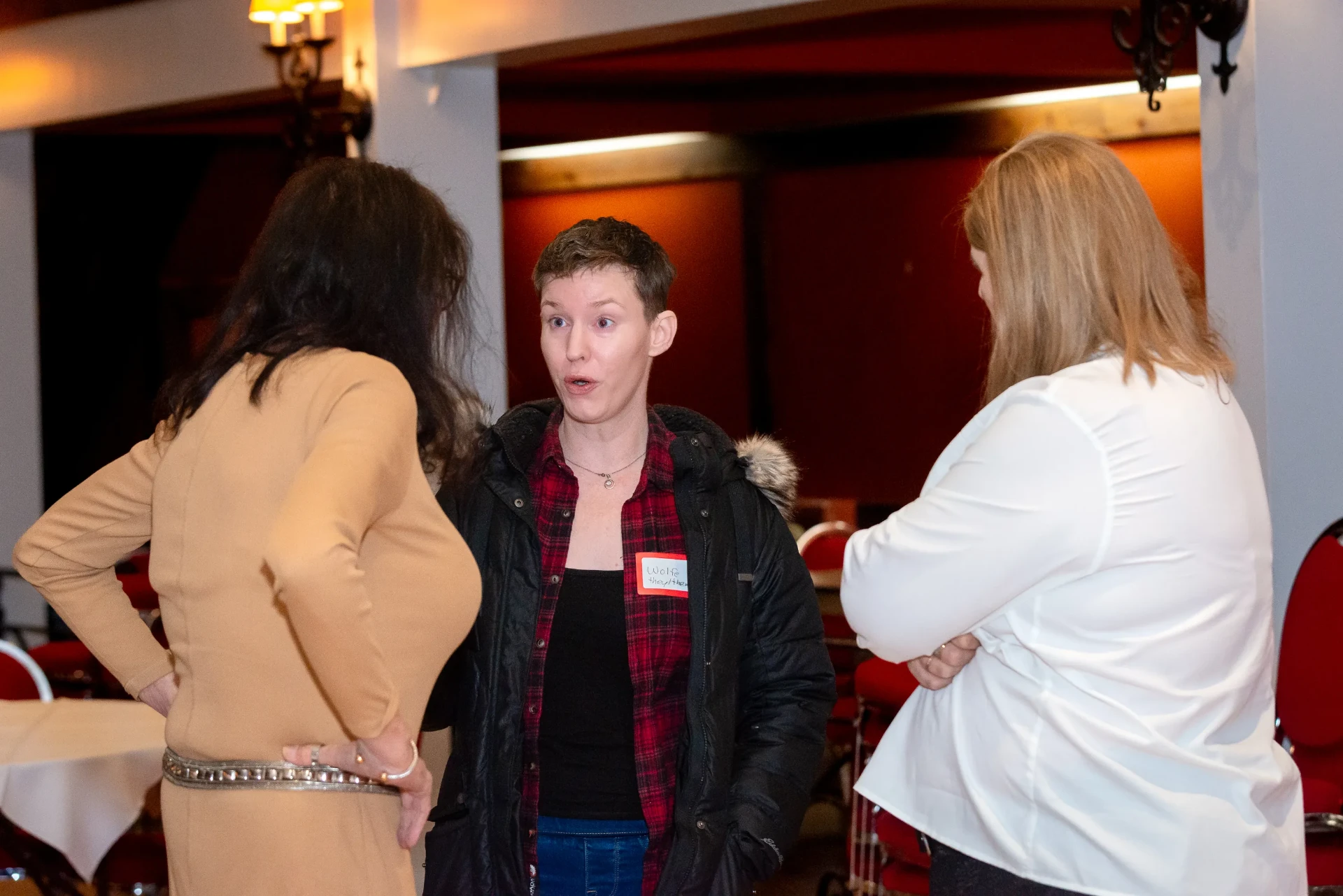 Guests in conversation during the book signing