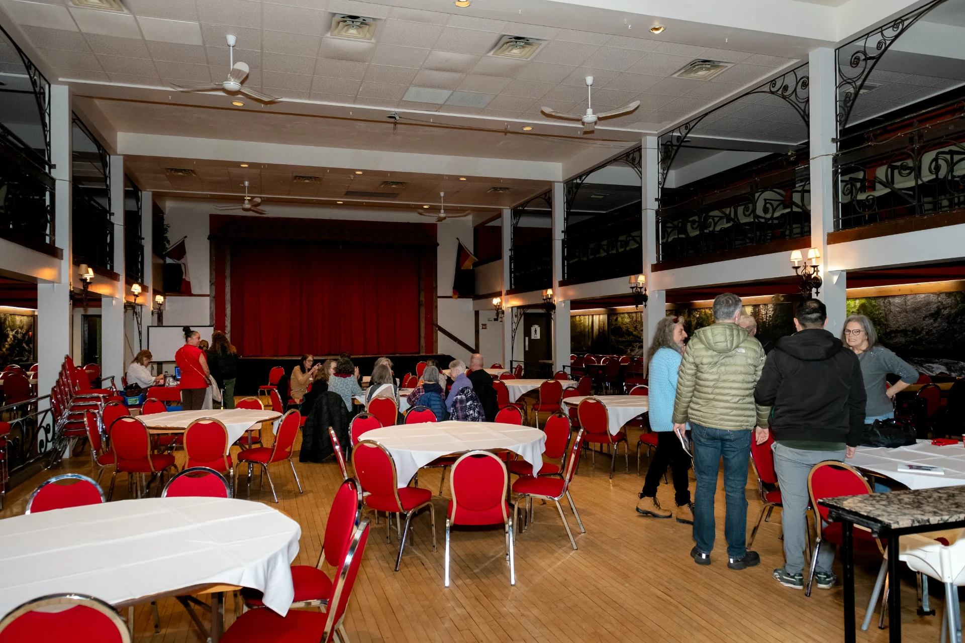 Wide view of the Germania Club hall during the event